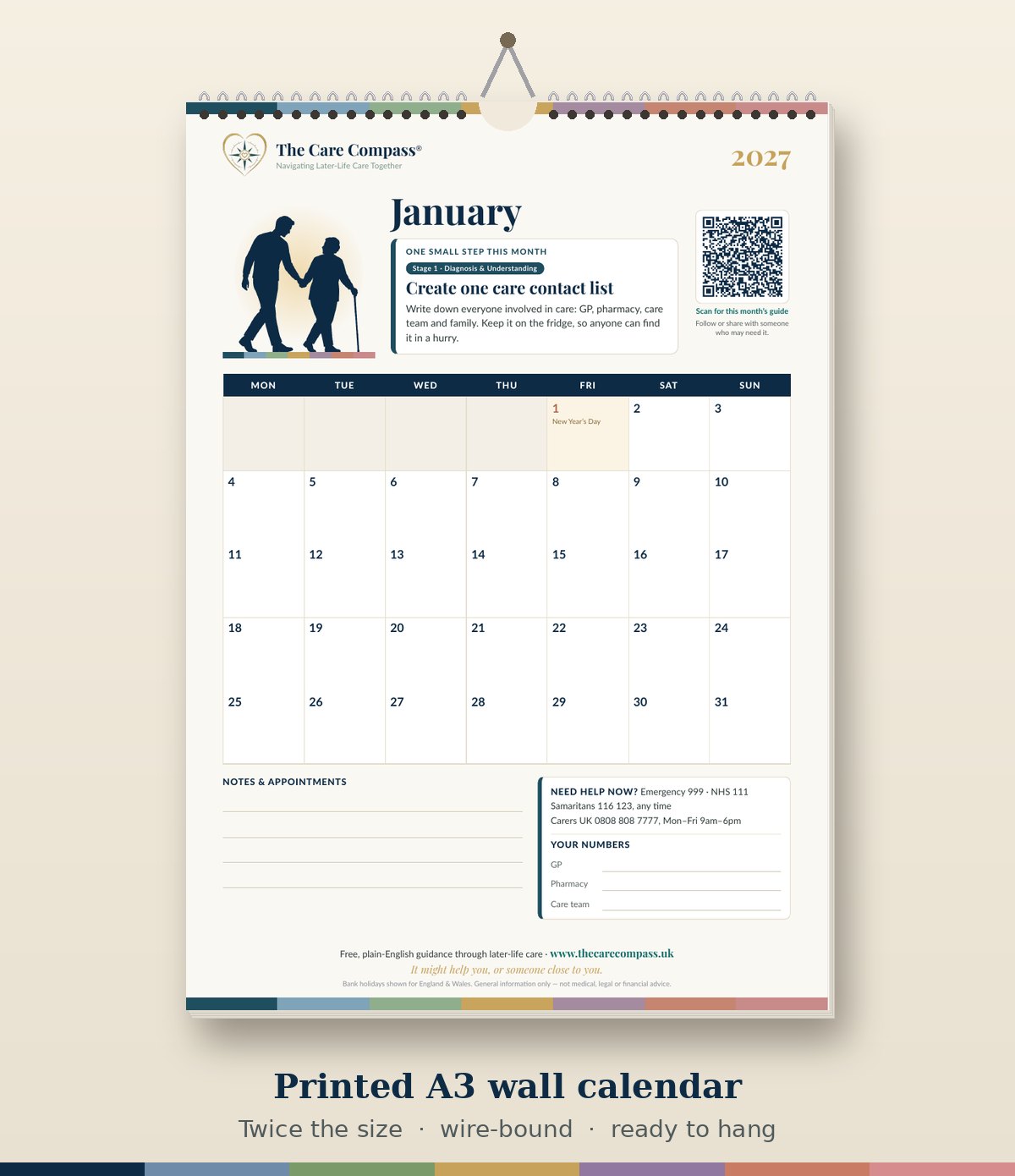 Mock-up of the printed A3 wall calendar, wire-bound and hanging on a wall, showing the January page